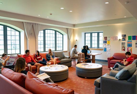 Image of students interacting in lounge.